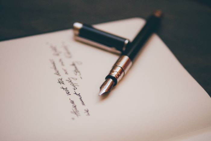 Image of a pen and paper for Josh Stieber's blog at Winding Elm Psychology